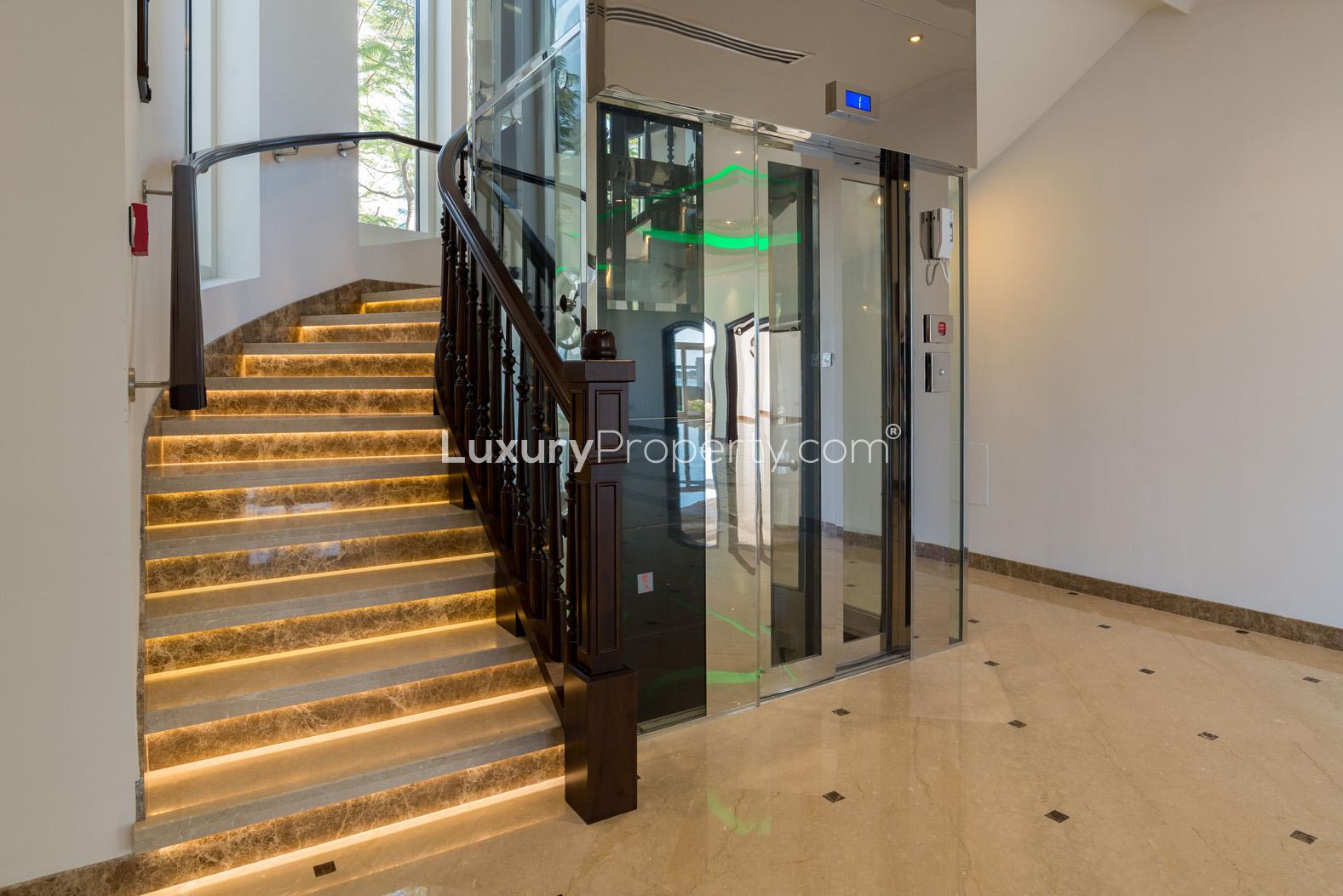 Luxurious staircase and elevator in Palm Jumeirah Signature Villa for sale, LP0782