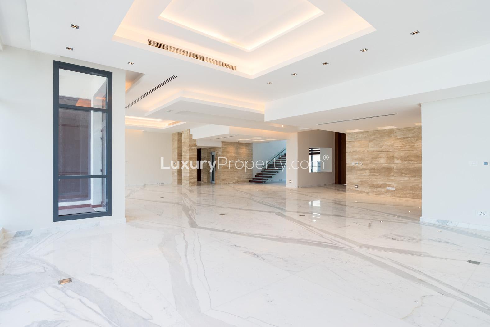 Luxurious open-plan interior of 6-bedroom villa, Palm Jumeirah, with elegant marble flooring