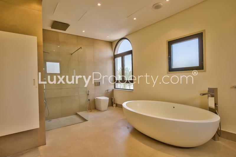 Empty bright room with large window in Signature Villas, Palm Jumeirah, Dubai