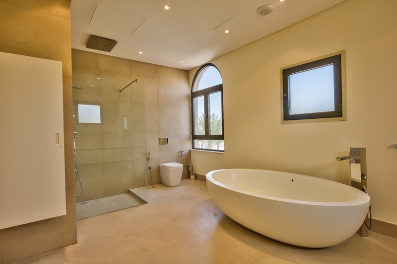 Empty bright room with large window in Signature Villas, Palm Jumeirah, Dubai