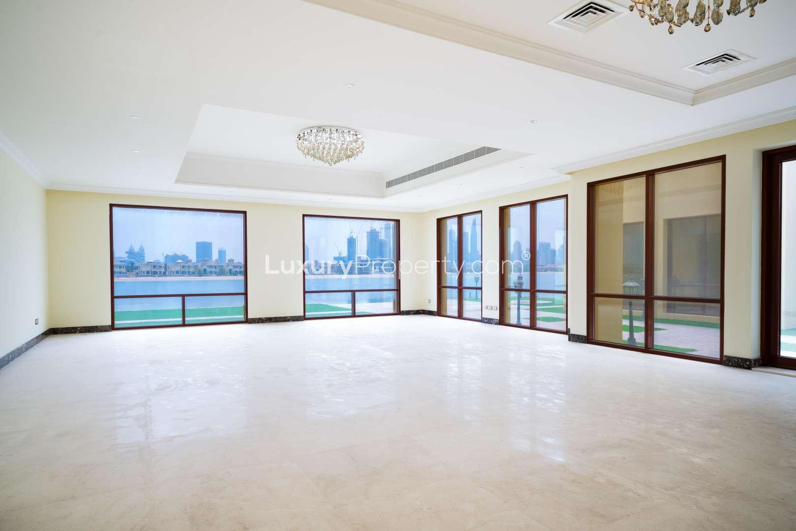 Interior view of luxury villa with large windows and ocean view, Palm Jumeirah