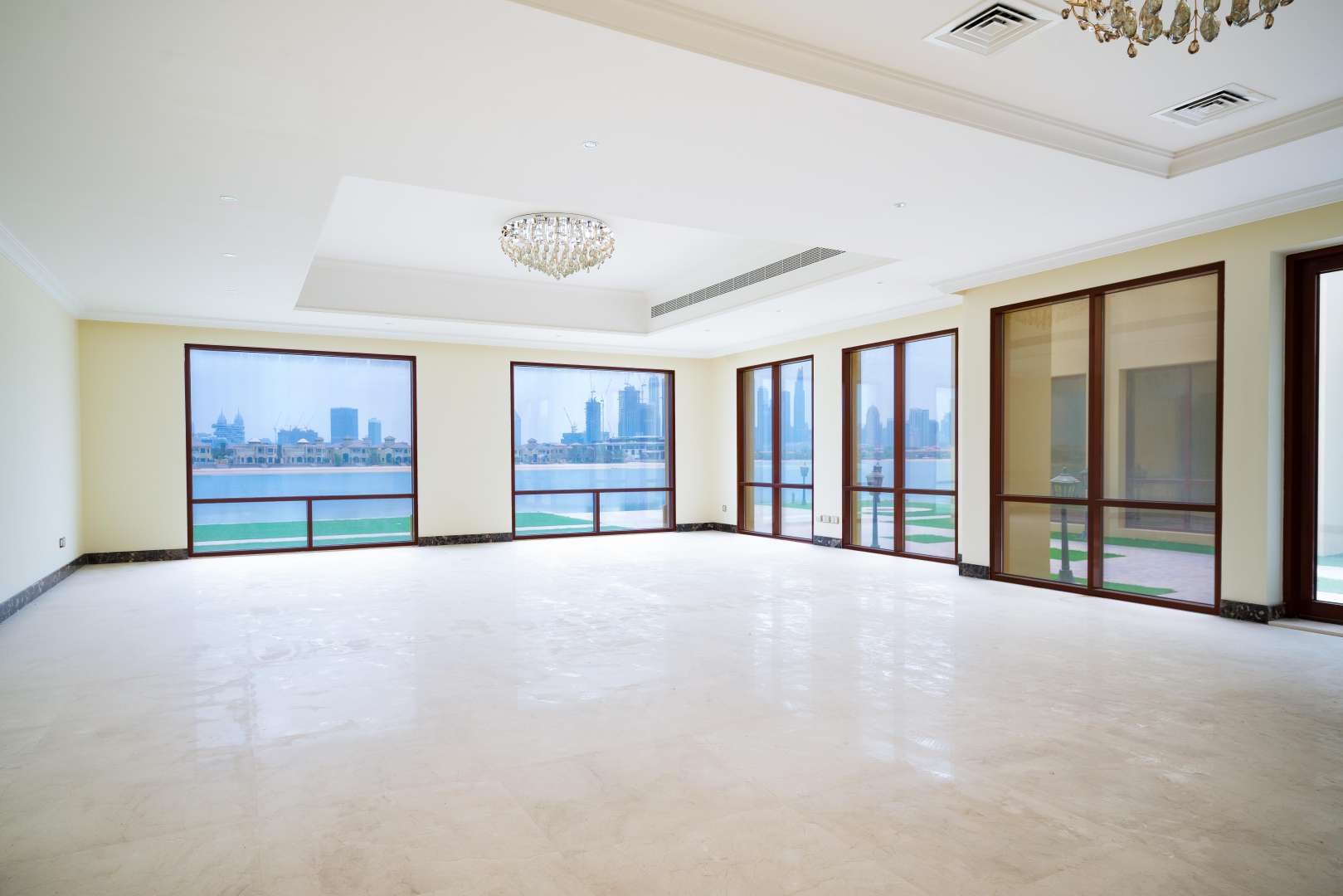 Interior view of luxury villa with large windows and ocean view, Palm Jumeirah