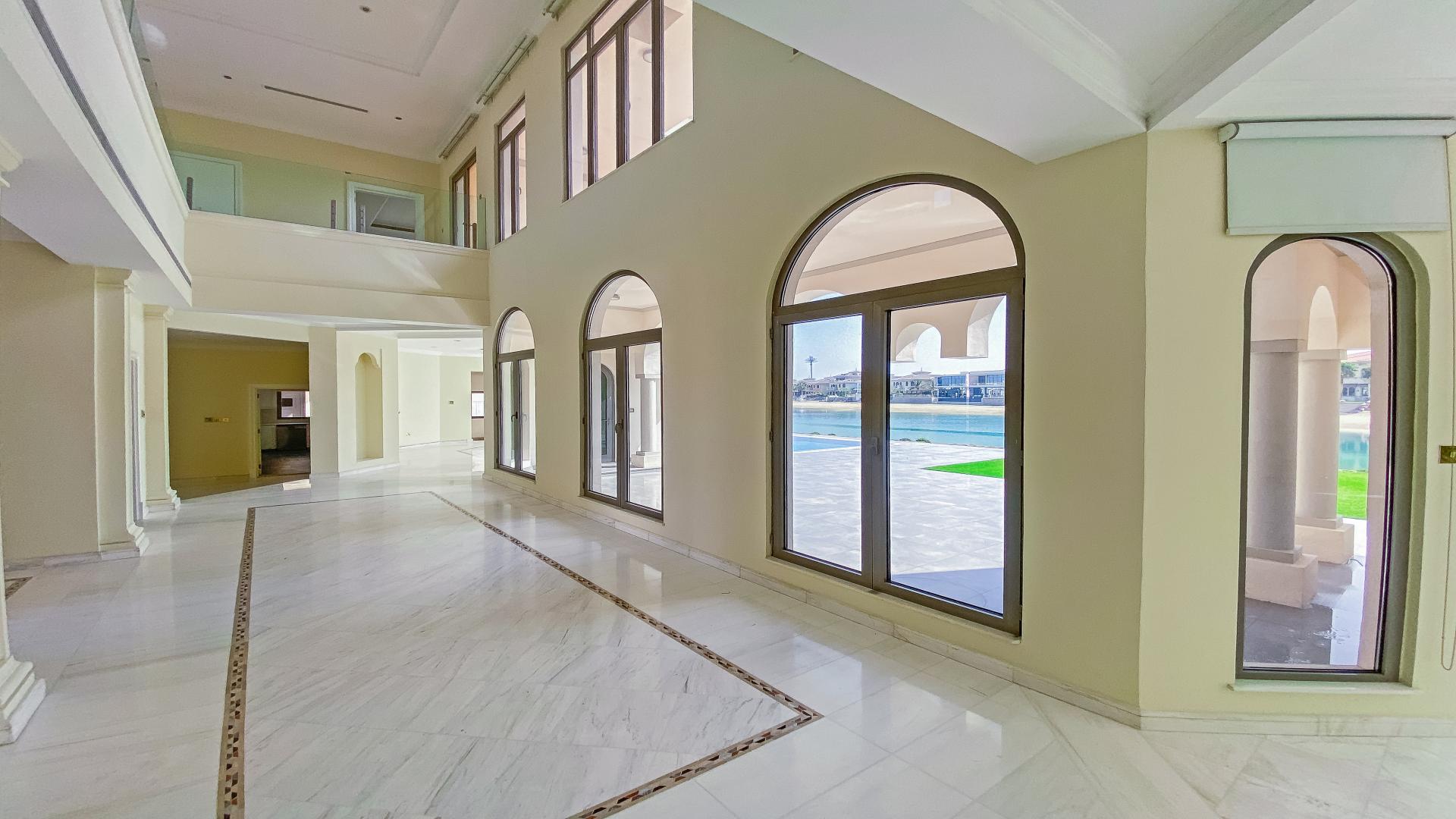 Luxurious interior of renovated 6-bedroom villa with pool view on Palm Jumeirah