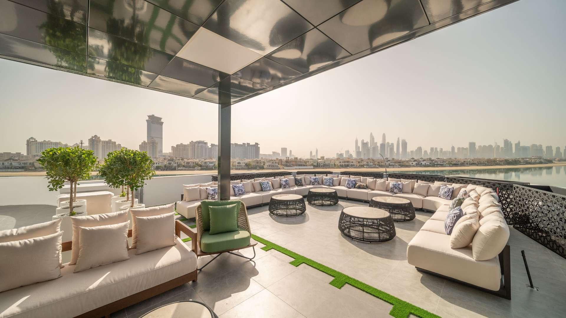 Luxurious rooftop terrace with city skyline view, Palm Jumeirah six-bedroom villa for sale