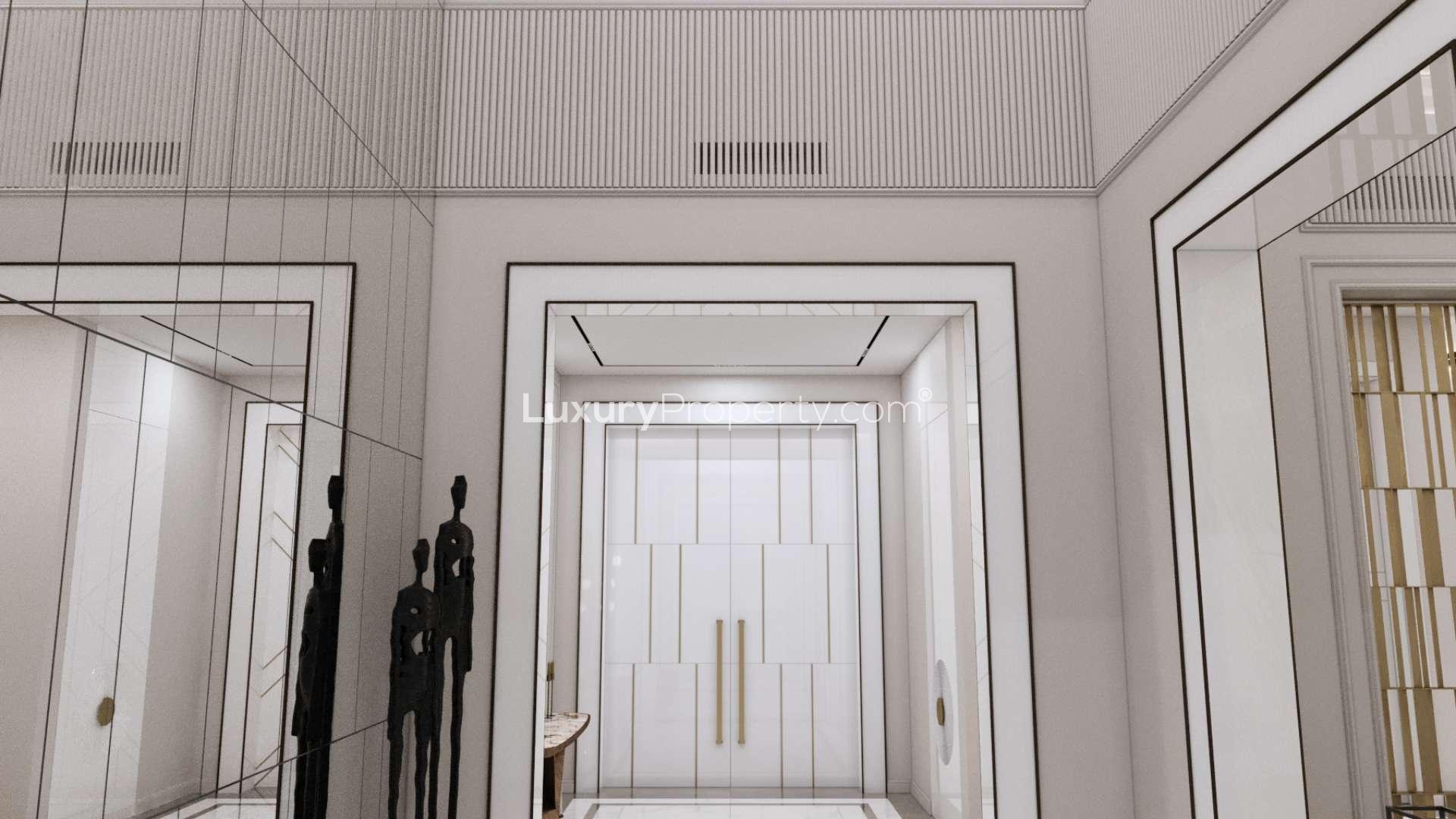 Luxurious entrance of custom villa in Al Barari, Silk Leaf, featuring elegant decor