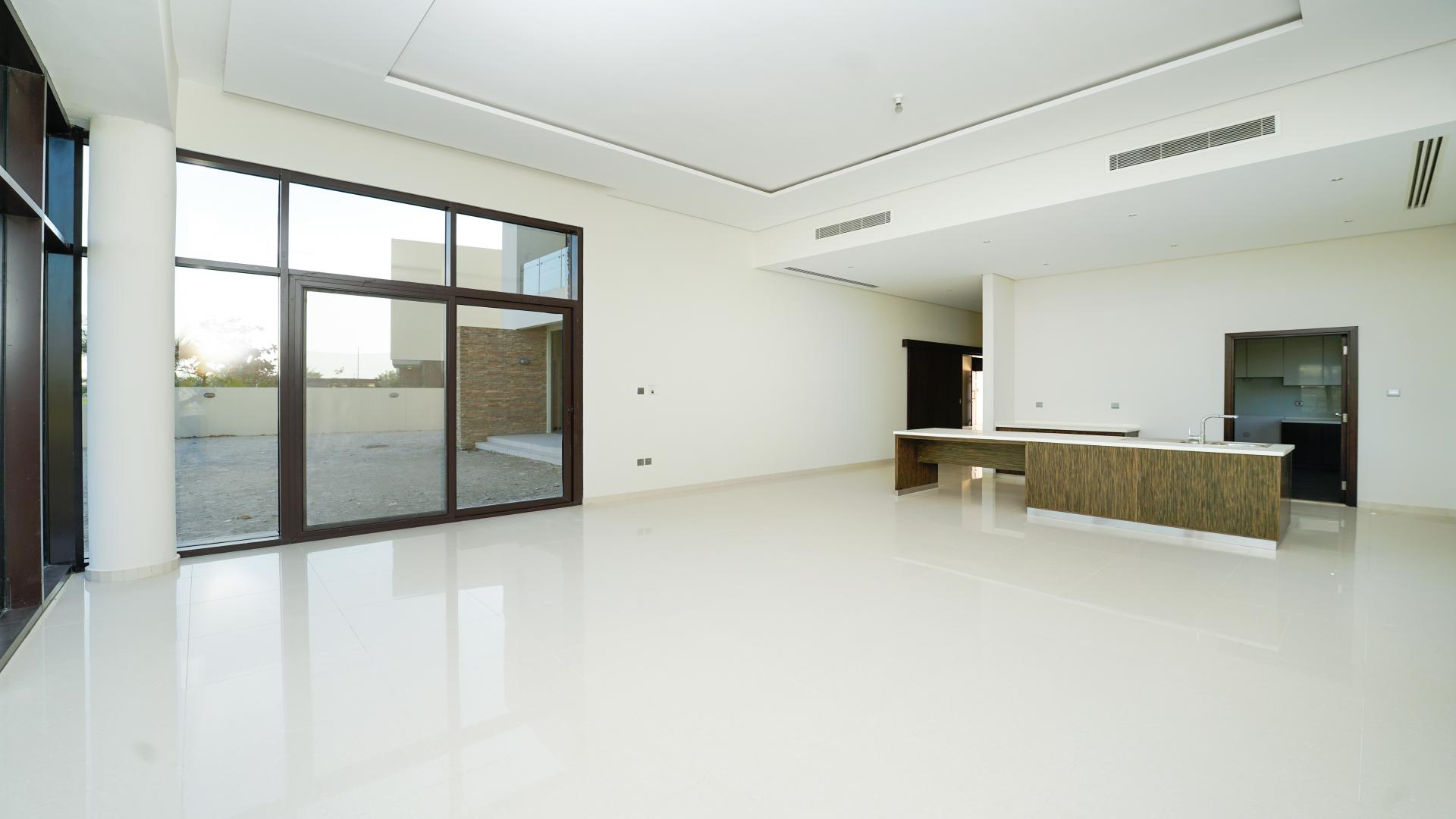 Brand new villa kitchen with large windows in Damac Hills, Silver Springs community