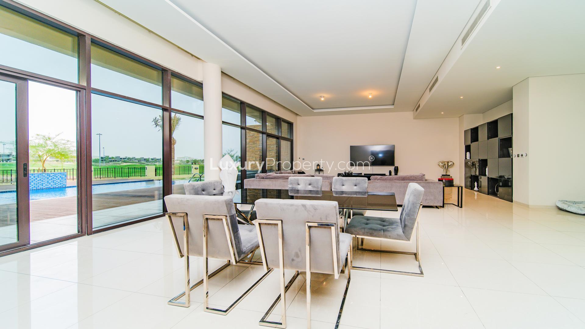 Modern villa interior with elegant dining area and spacious living room, Silver Springs, Damac Hills