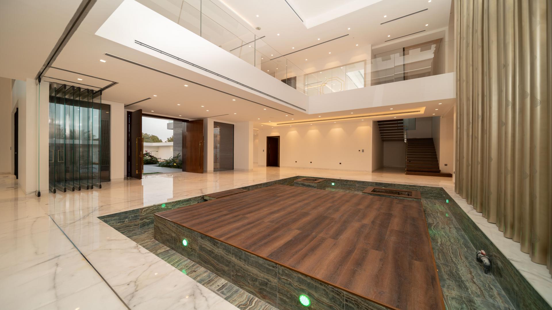 Luxurious open-plan living area in new villa, Umm Al Sheif, with modern design features