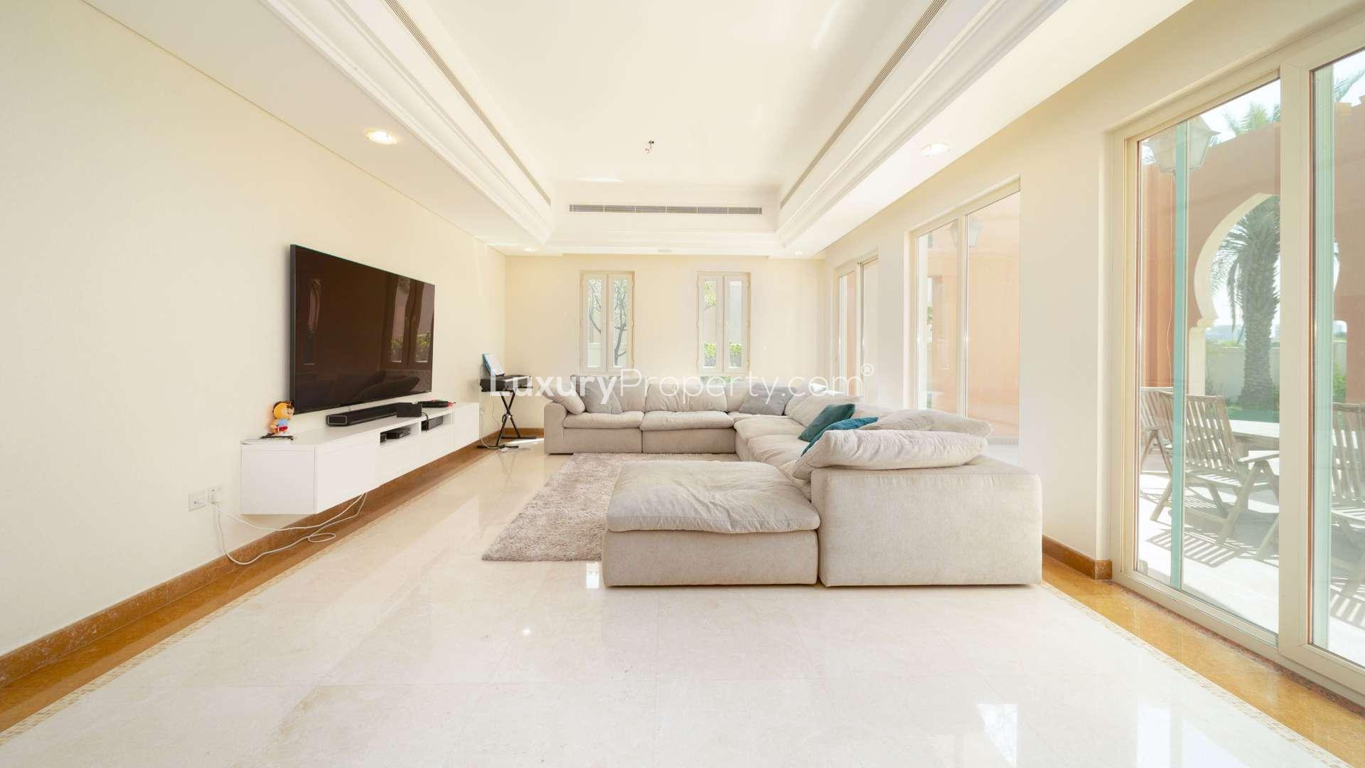 Interior view of spacious villa entrance with chandelier, Victory Heights, Dubai Sports City
