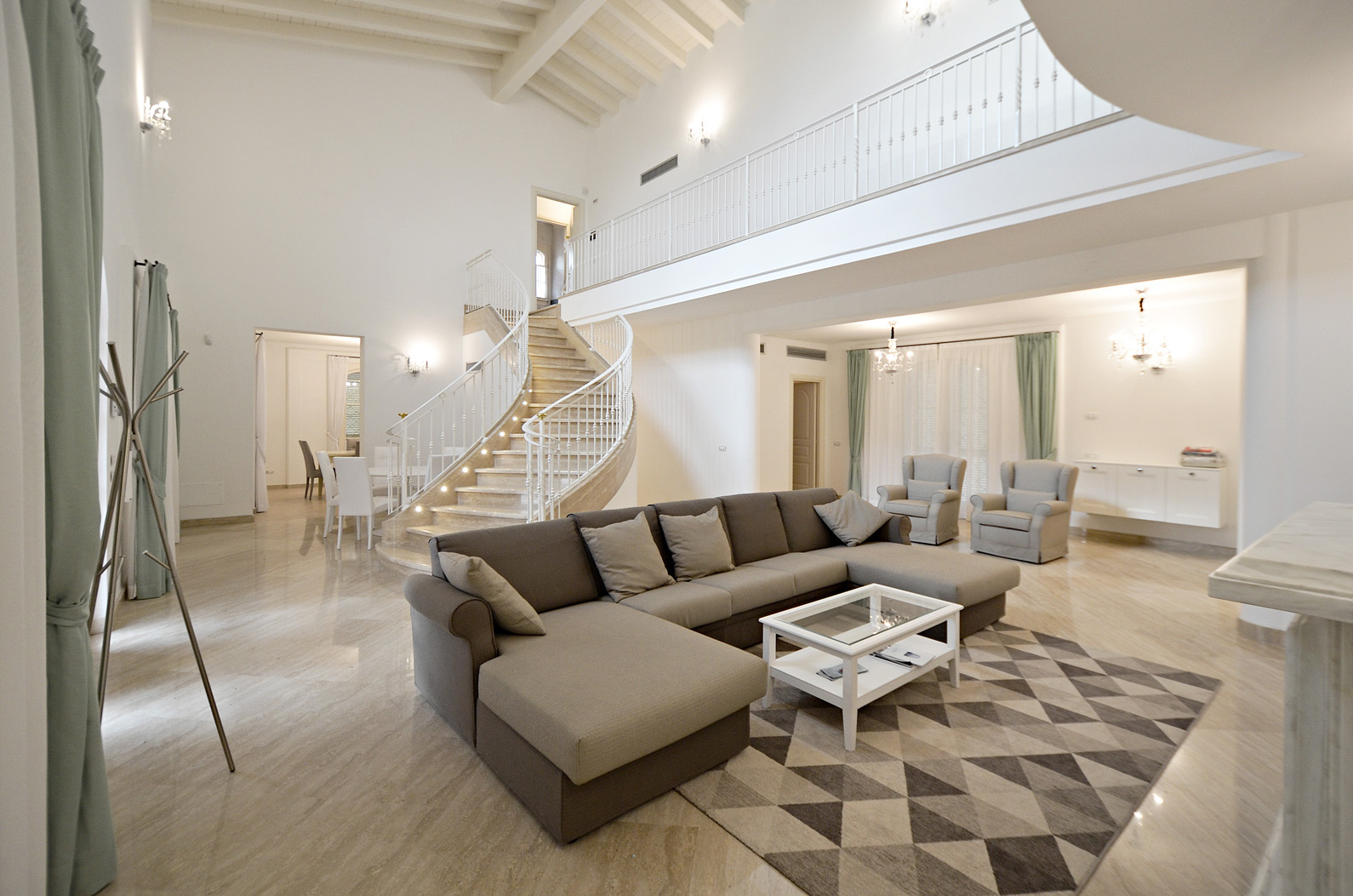 Luxurious villa interior with elegant staircase in Villa Botticelli, Lucca