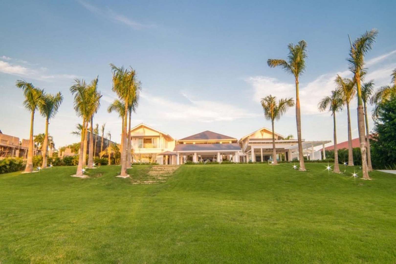 Villa exterior with garden and golf cart, Casa de Campo, La Romana, for sale