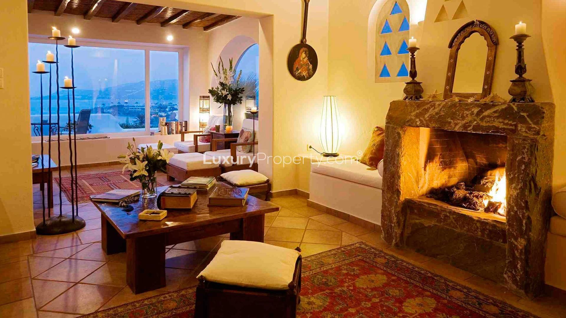 Breathtaking sea view from luxury Mykonos villa terrace, featuring elegant outdoor seating area