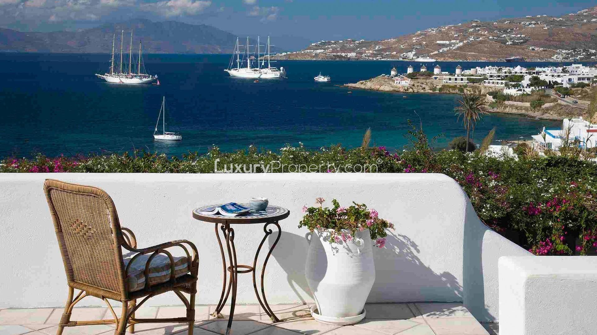 Cozy kitchen in 6-bedroom villa near Mykonos Town, featuring rustic dining table and decor