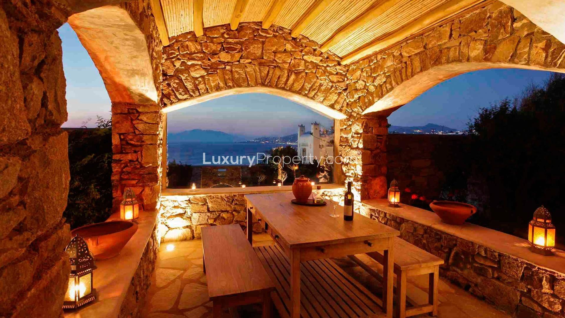 Stone terrace with sea view at dusk