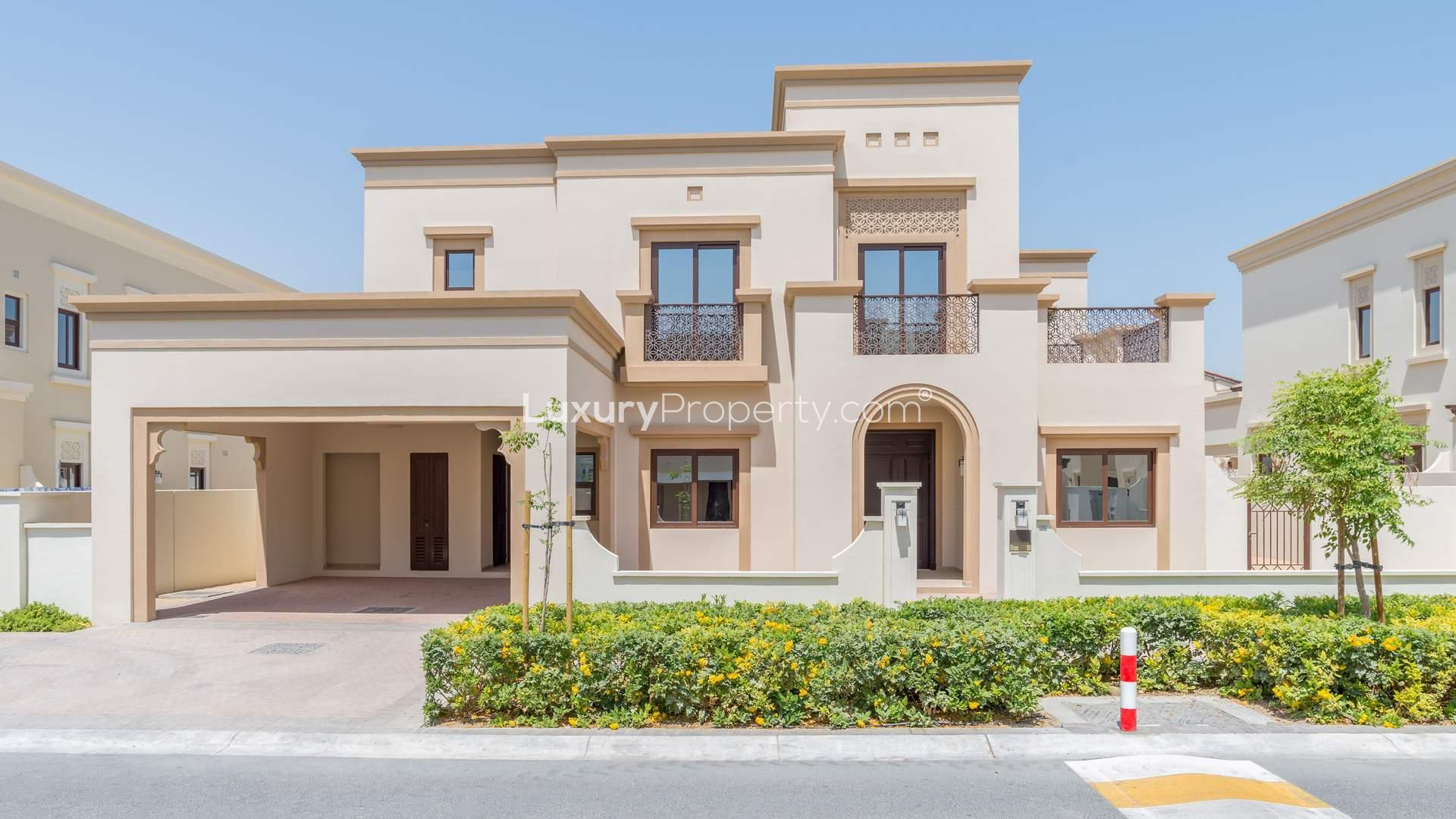 Playground in Yasmin, Arabian Ranches 2 villa community, vibrant equipment, shaded area