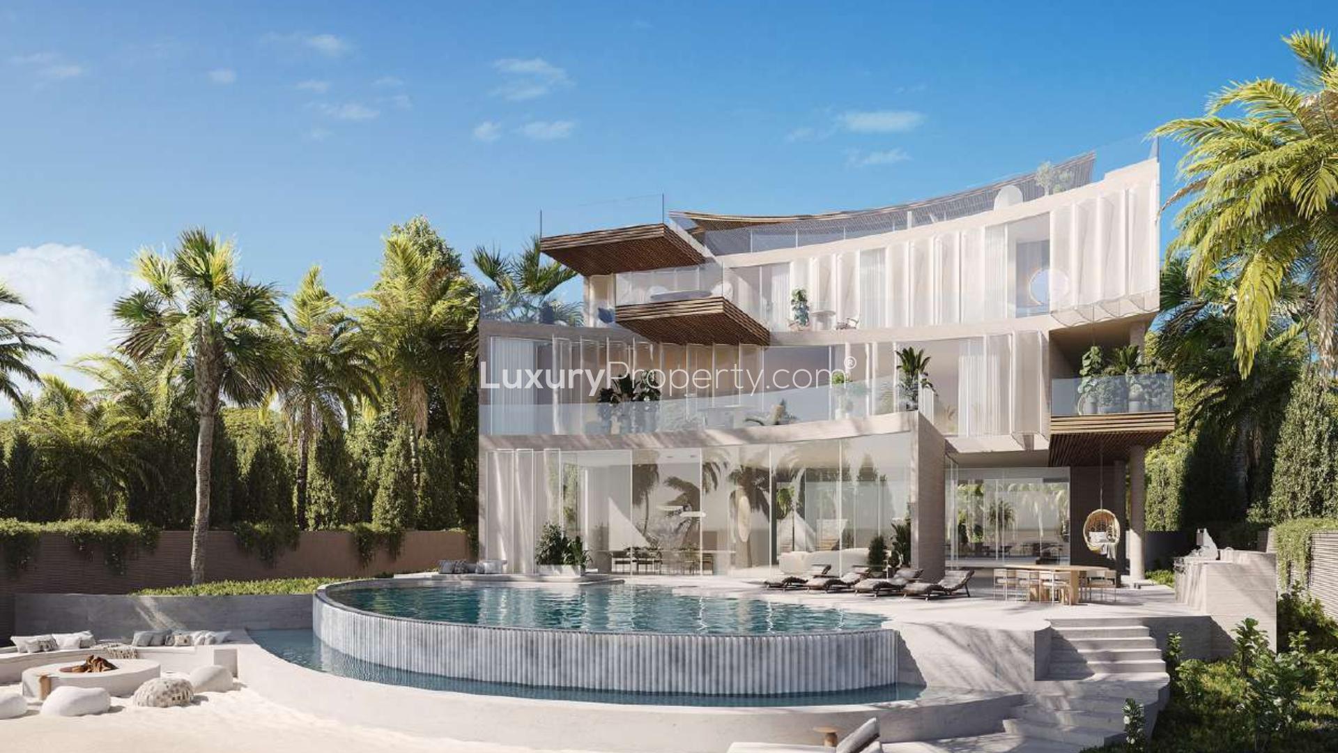 Spectacular waterfront villa on Zuha Island with modern architecture and lush surroundings