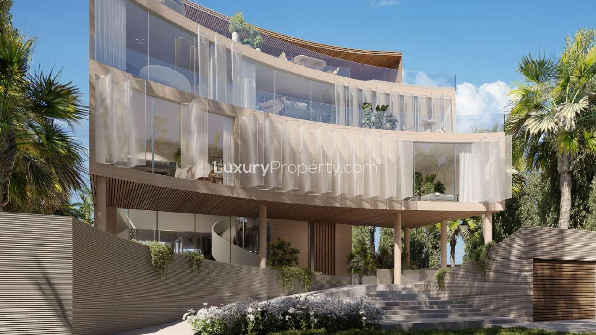 Luxurious waterfront villa on Zuha Island with infinity pool and outdoor lounge area