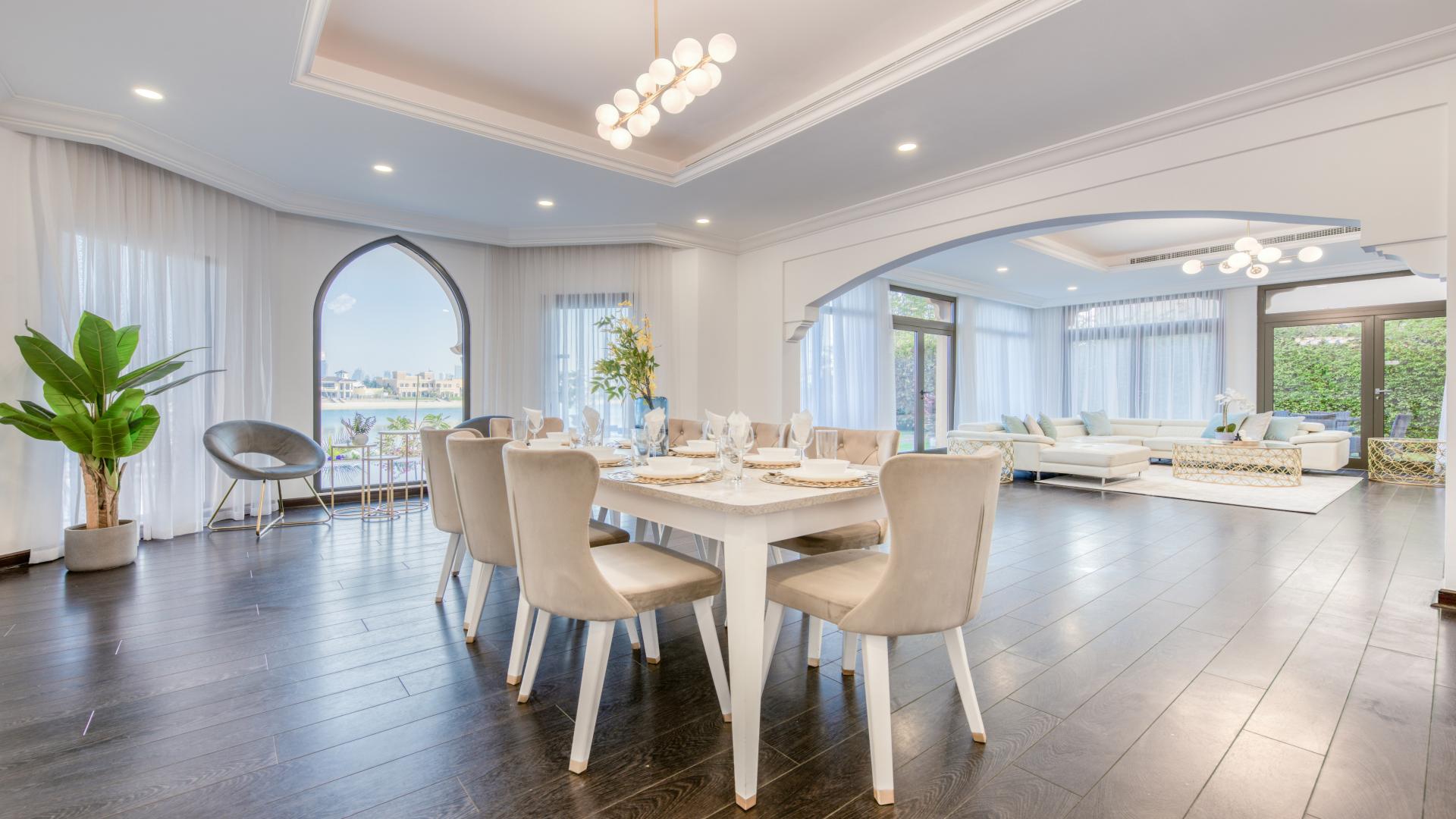 Luxury dining and living area in modern Palm Jumeirah villa, Garden Homes, Dubai