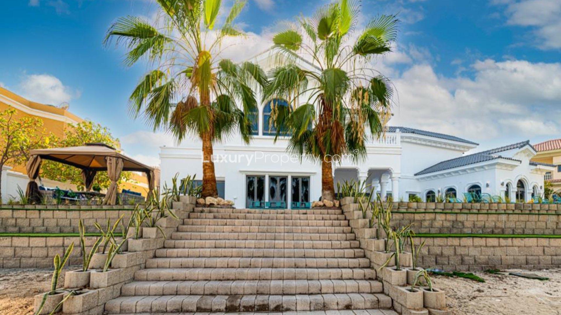 Furnished villa patio with pool view in Palm Jumeirah Signature Villas, short-term rental