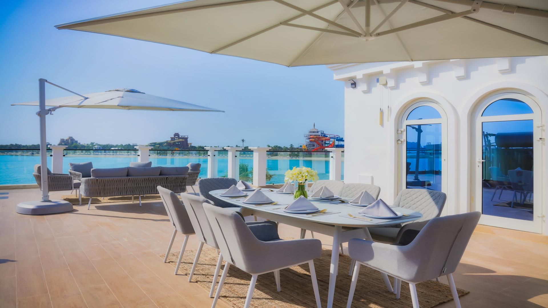 Modern kitchen in Villa Verona, Signature Villas, Palm Jumeirah, featuring sleek cabinetry and appliances