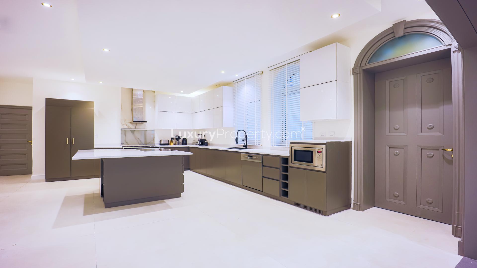 Luxurious living room in Villa Verona, Palm Jumeirah, featuring elegant furnishings and grand piano