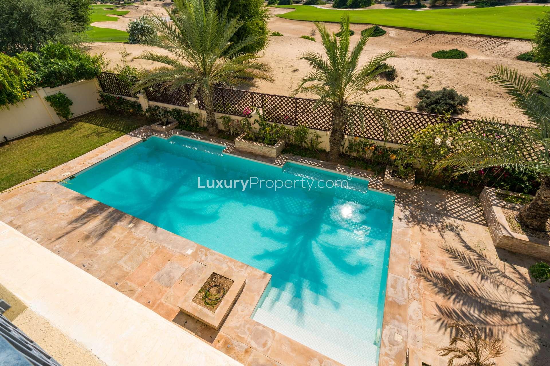 Luxury villa pool with golf course views in Victory Heights, Dubai Sports City