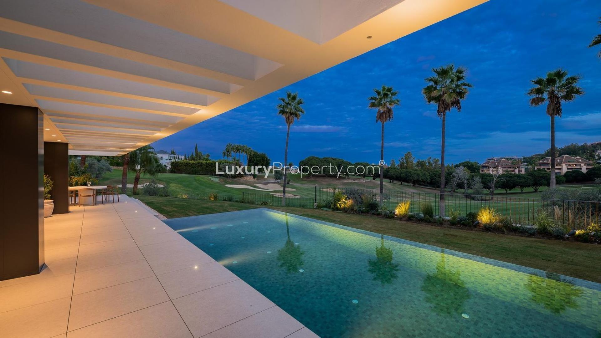 Stunning four-bedroom villa with pool in Marbella’s Golf Valley, Málaga, at twilight