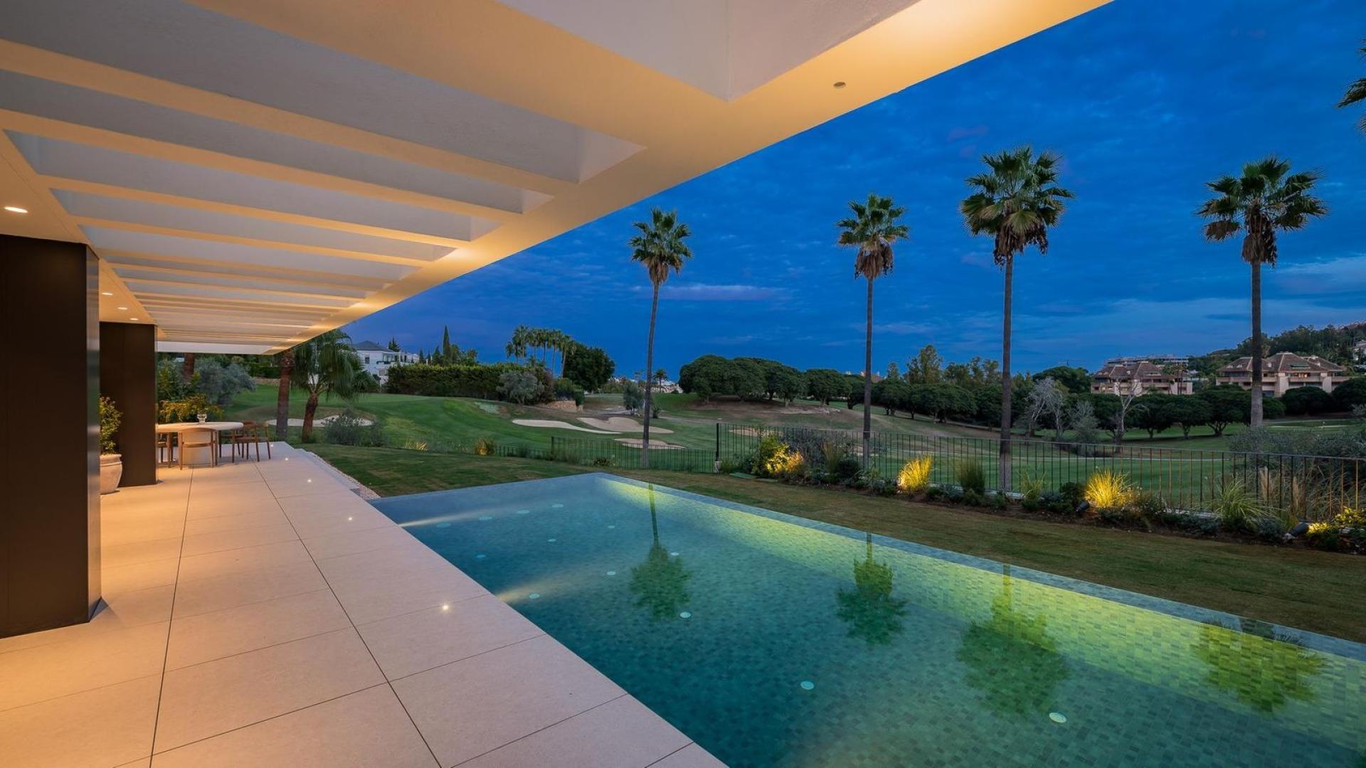 Stunning four-bedroom villa with pool in Marbella’s Golf Valley, Málaga, at twilight