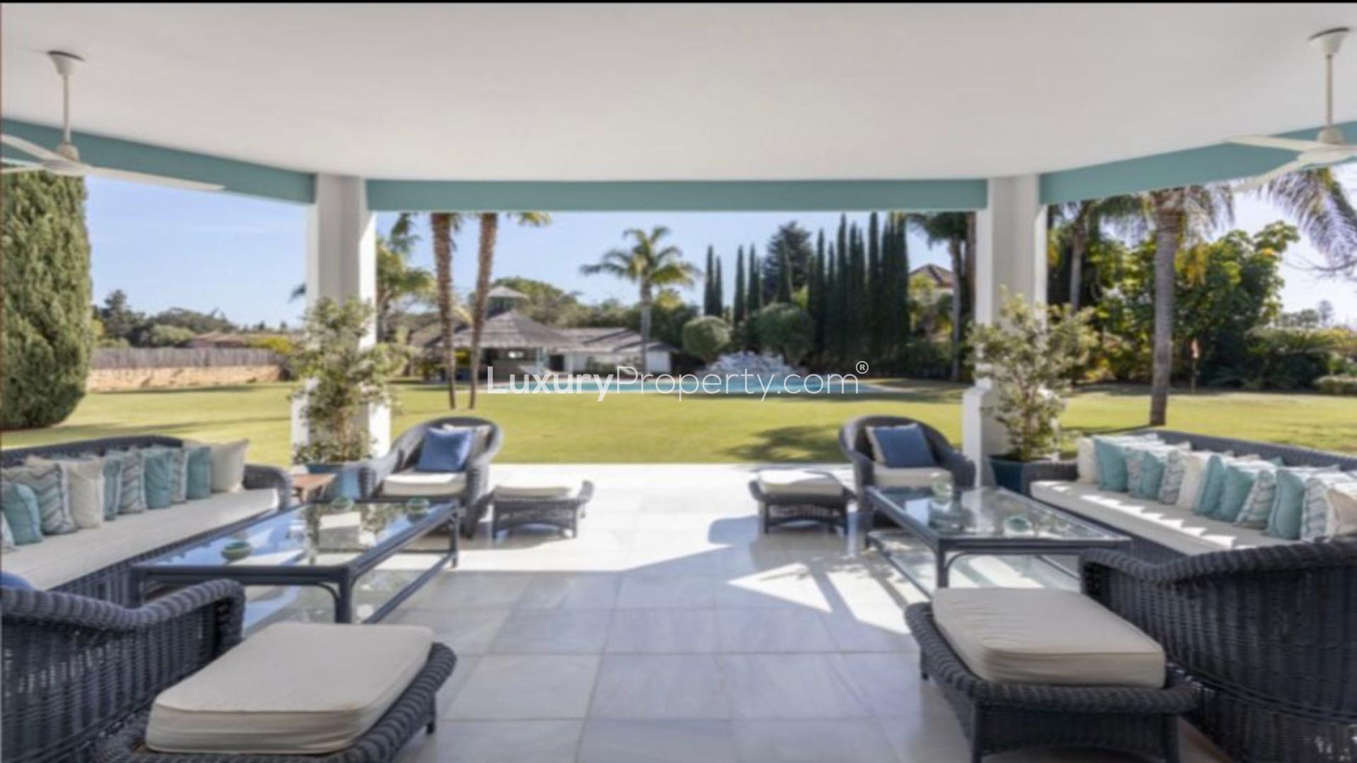 Luxury detached villa for sale in Guadalmina Baja, Marbella with spacious garden view