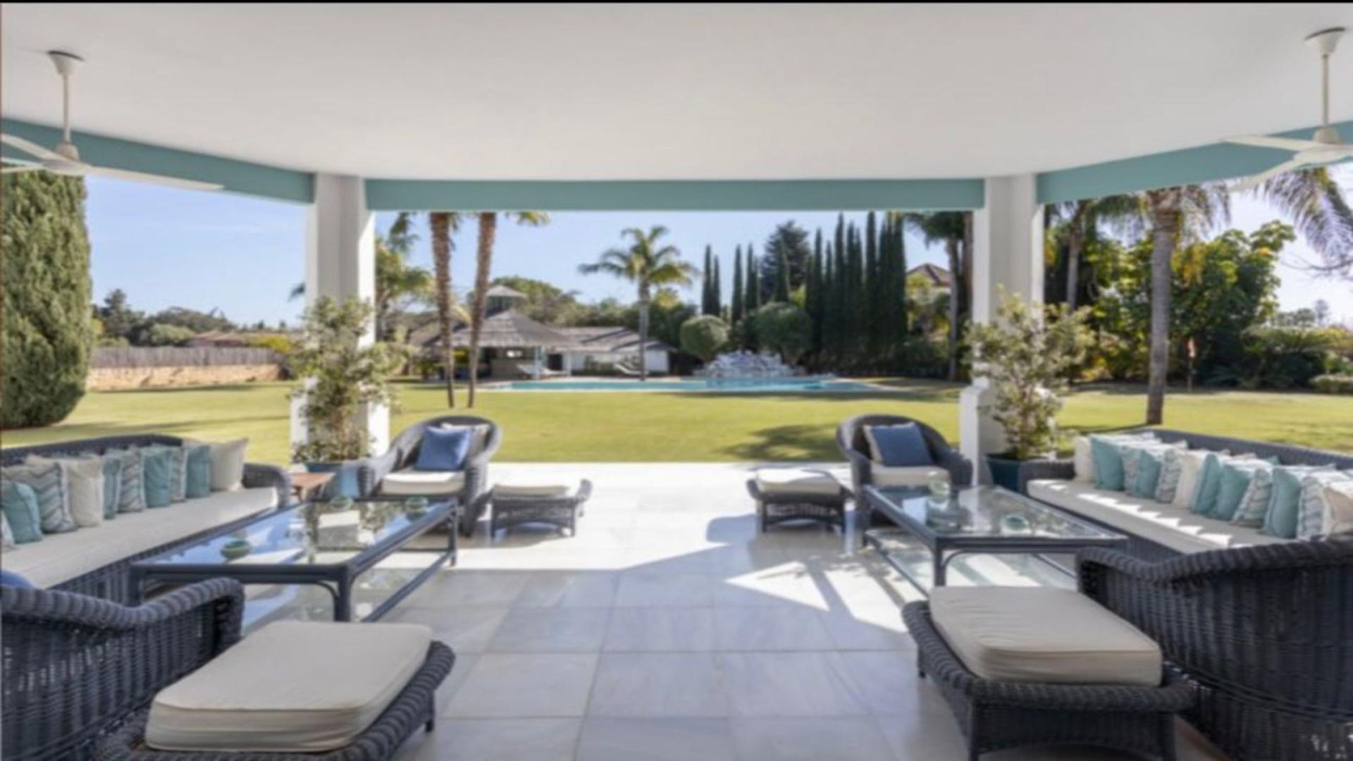 Luxury detached villa for sale in Guadalmina Baja, Marbella with spacious garden view