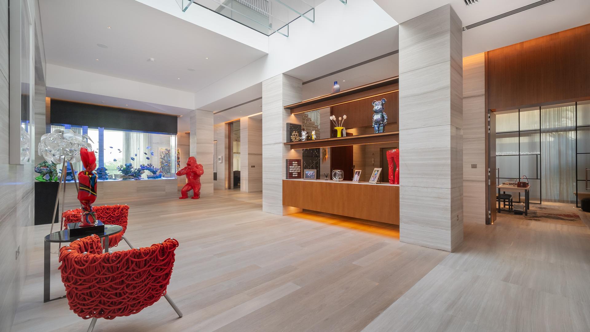 Modern interior courtyard with tree in exclusive Dubai Hills Grove mansion