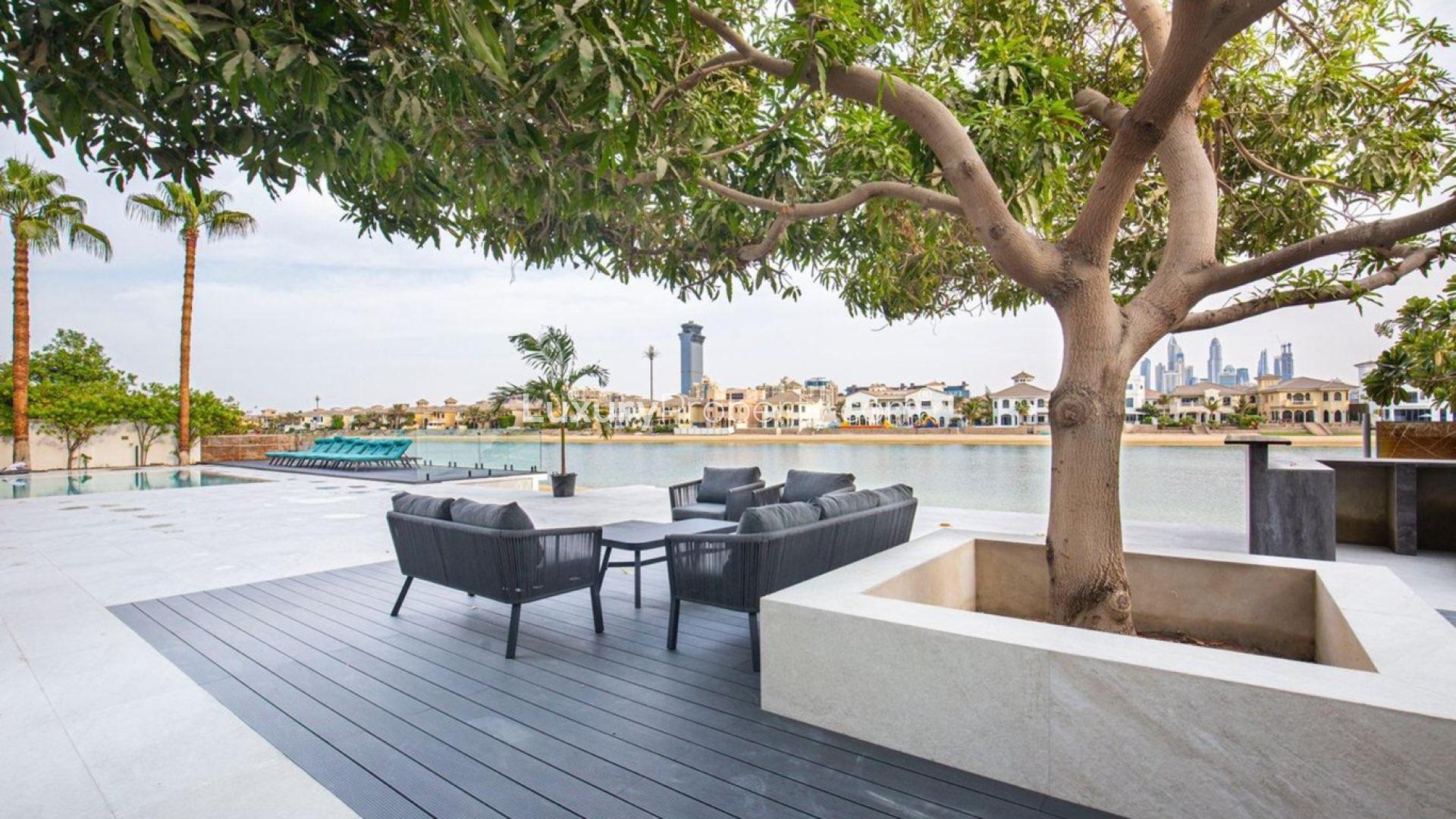 Contemporary living room with waterfront view in Palm Jumeirah Signature Villas mansion