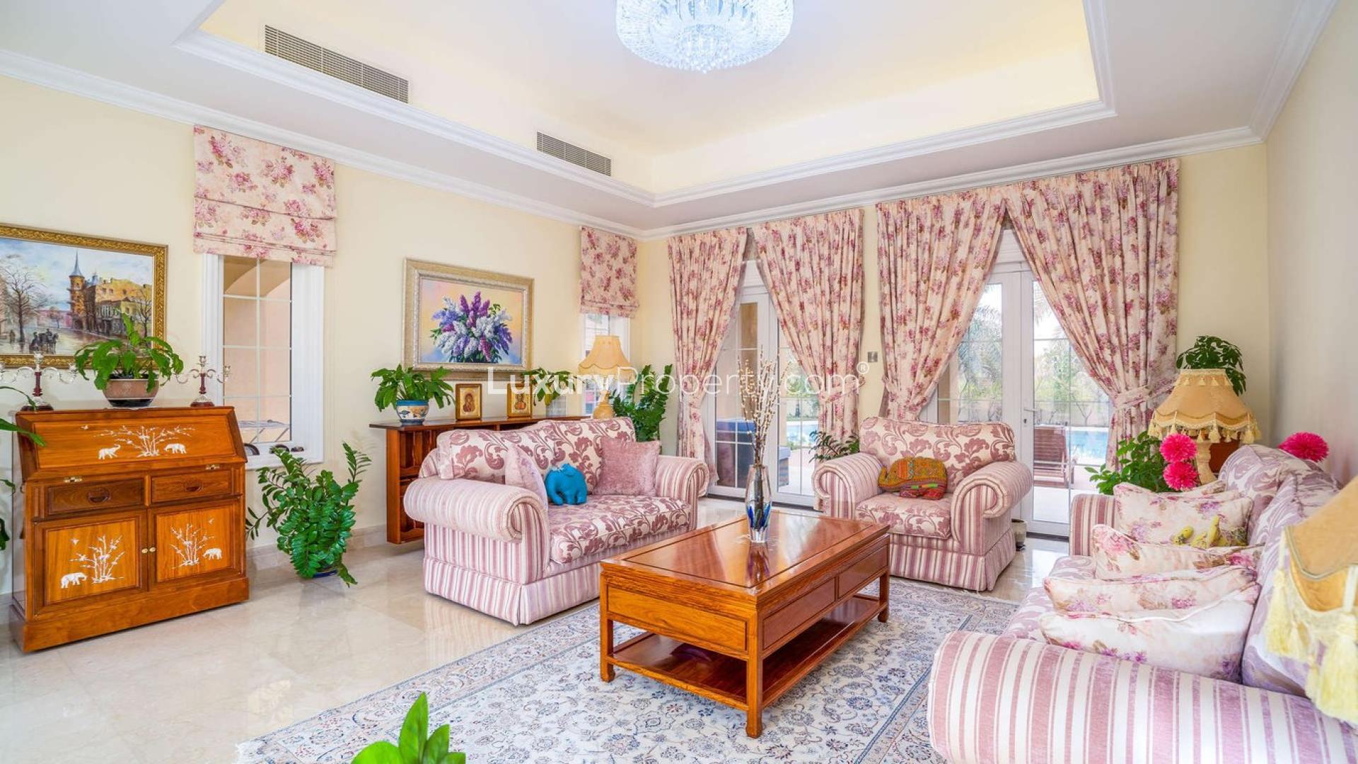 Luxurious living room in 7-bedroom villa, Arabian Ranches, featuring elegant floral decor