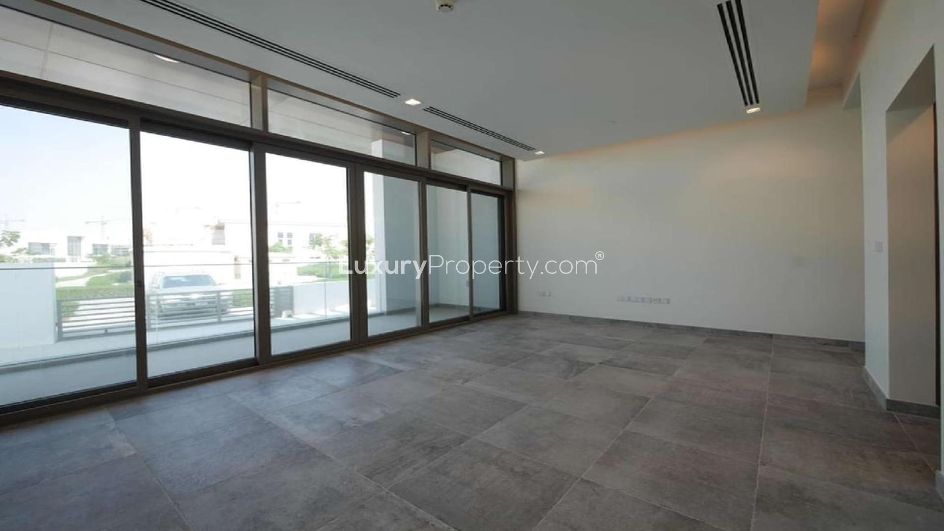 Contemporary open-plan kitchen in District One villa, Mohammed Bin Rashid City, luxury marble flooring