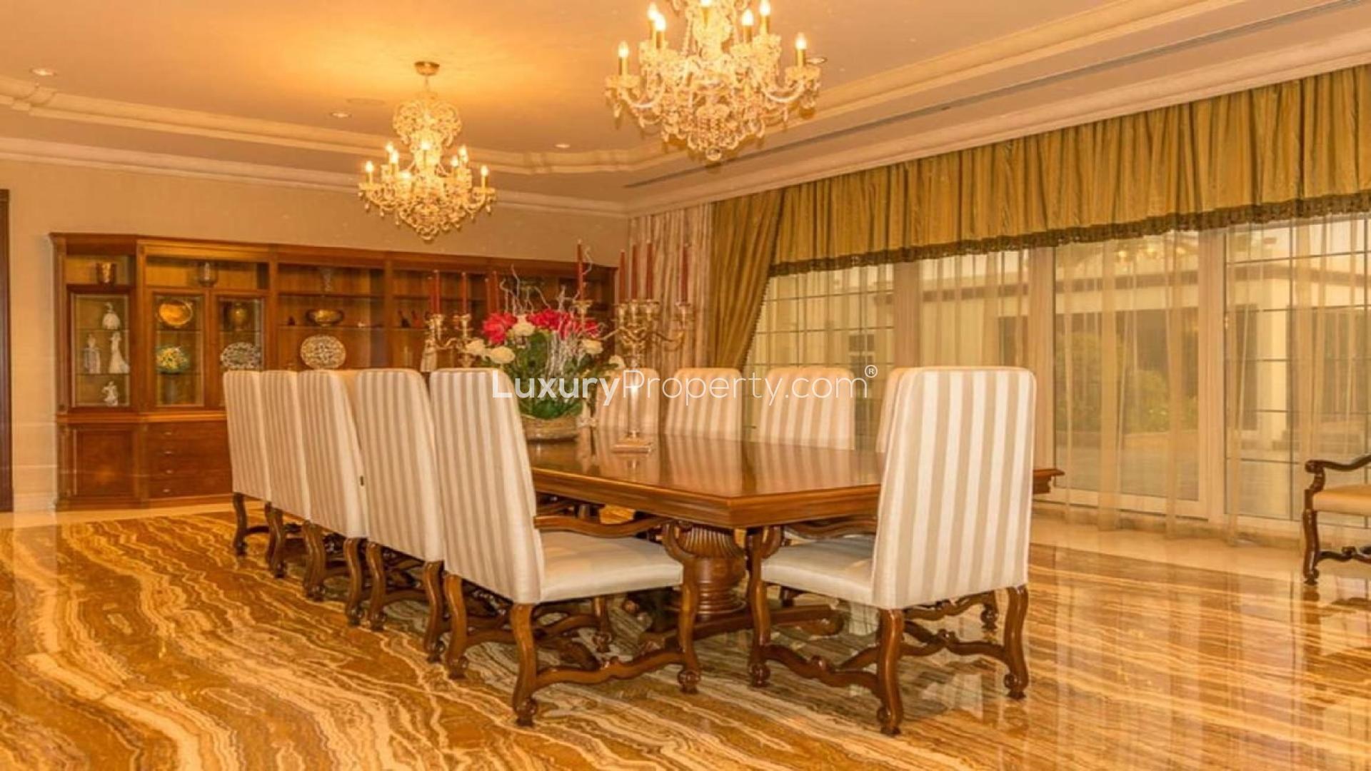 Luxurious 7-bedroom villa with lush garden and pool in Emirates Hills, Sector L