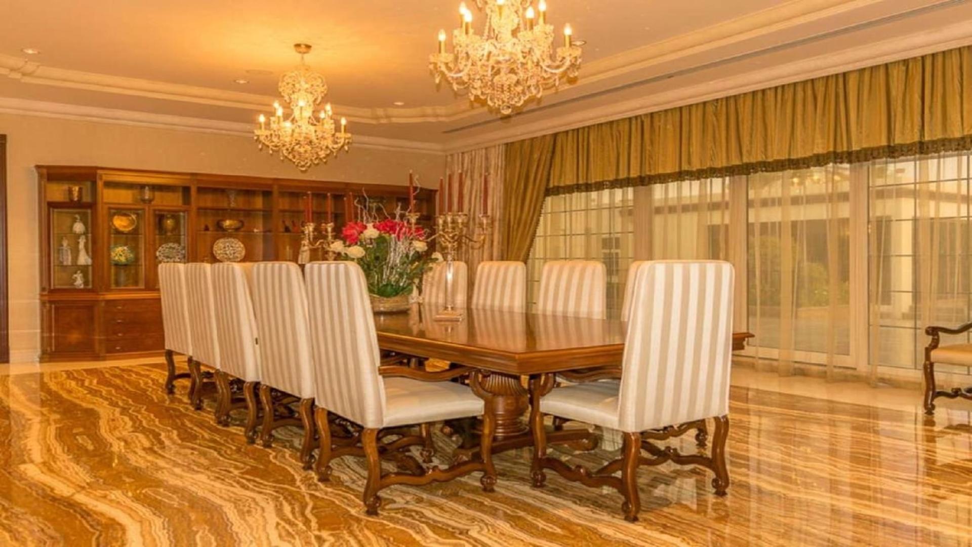 Luxurious 7-bedroom villa with lush garden and pool in Emirates Hills, Sector L