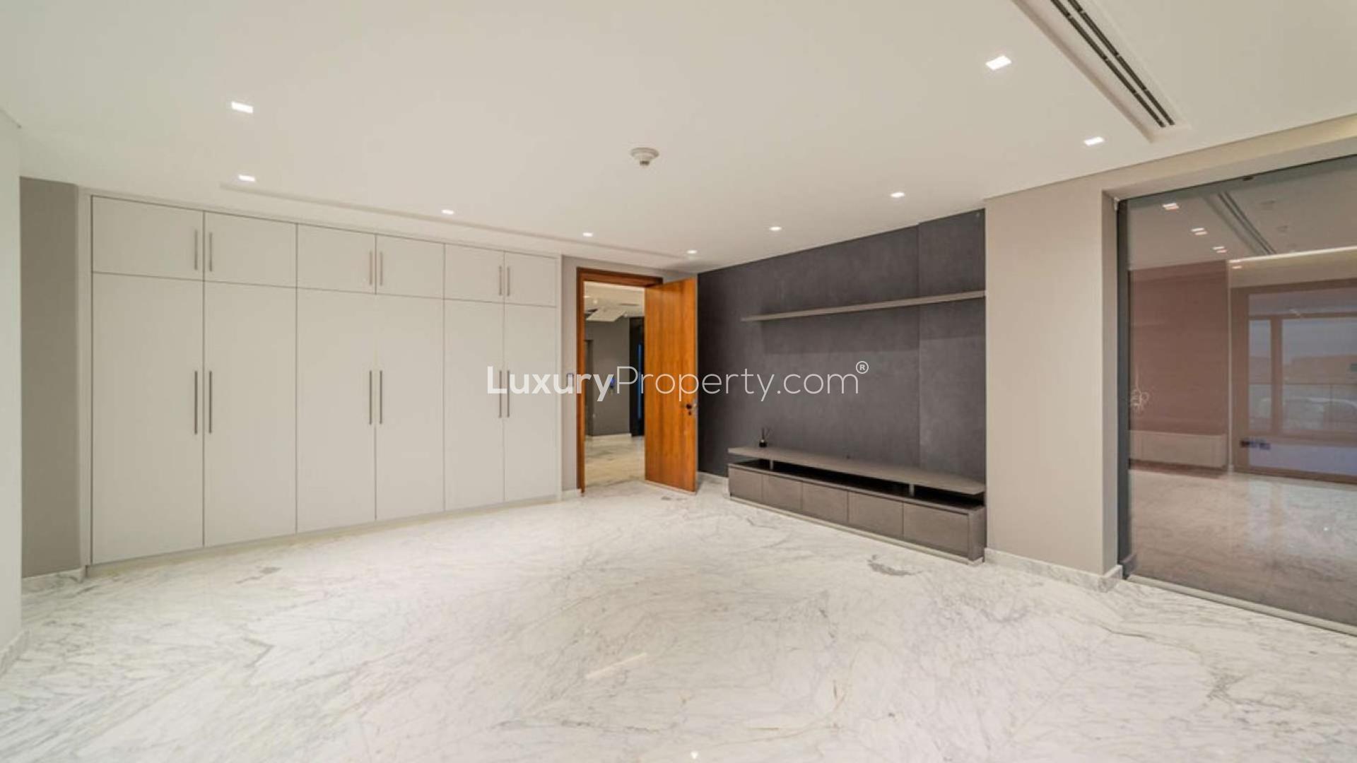 Sunset view of luxury villa with pool at Palm Jumeirah, Signature Villas