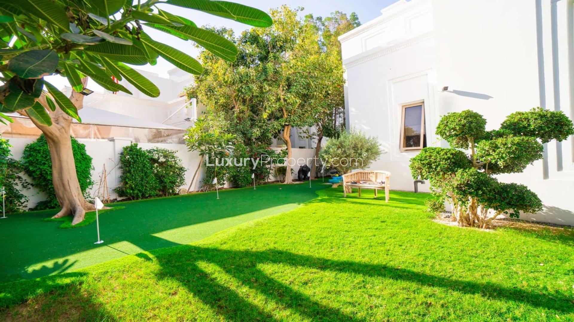 Luxurious living room in Al Barari villa with modern decor and spacious seating area