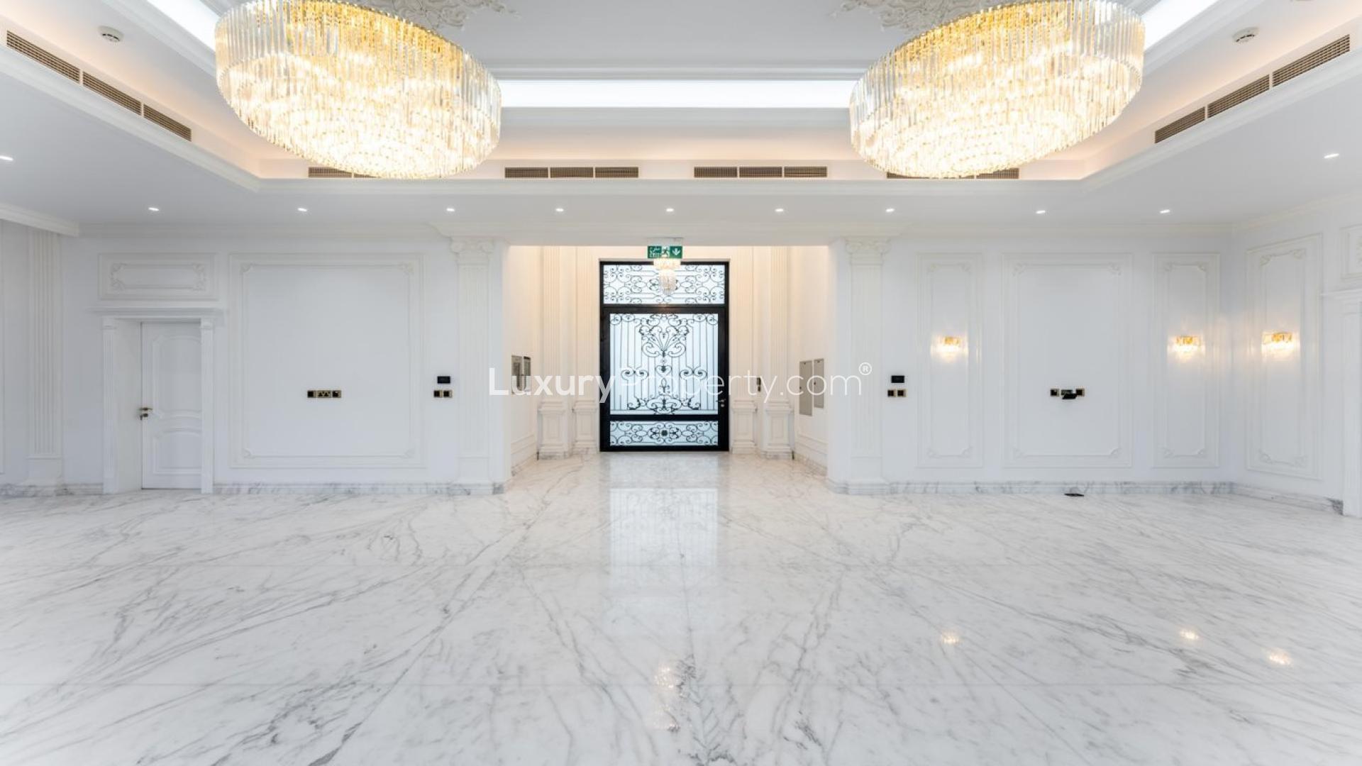 Luxurious marble-floored villa interior with chandeliers on Pearl Jumeirah, Jumeirah