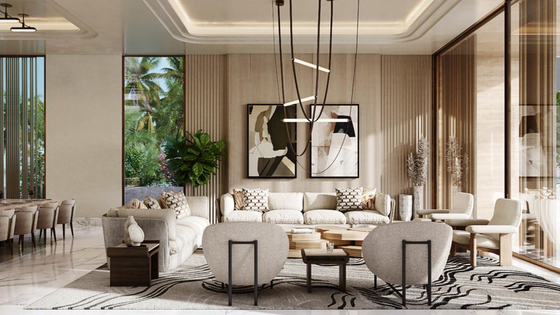 Luxurious living room in Elysian Mansions villa with modern decor and scenic views