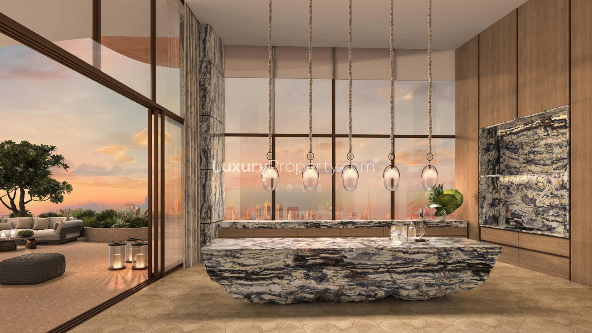 Luxurious Jumeirah Asora Bay penthouse lounge with stunning sunset views and elegant decor