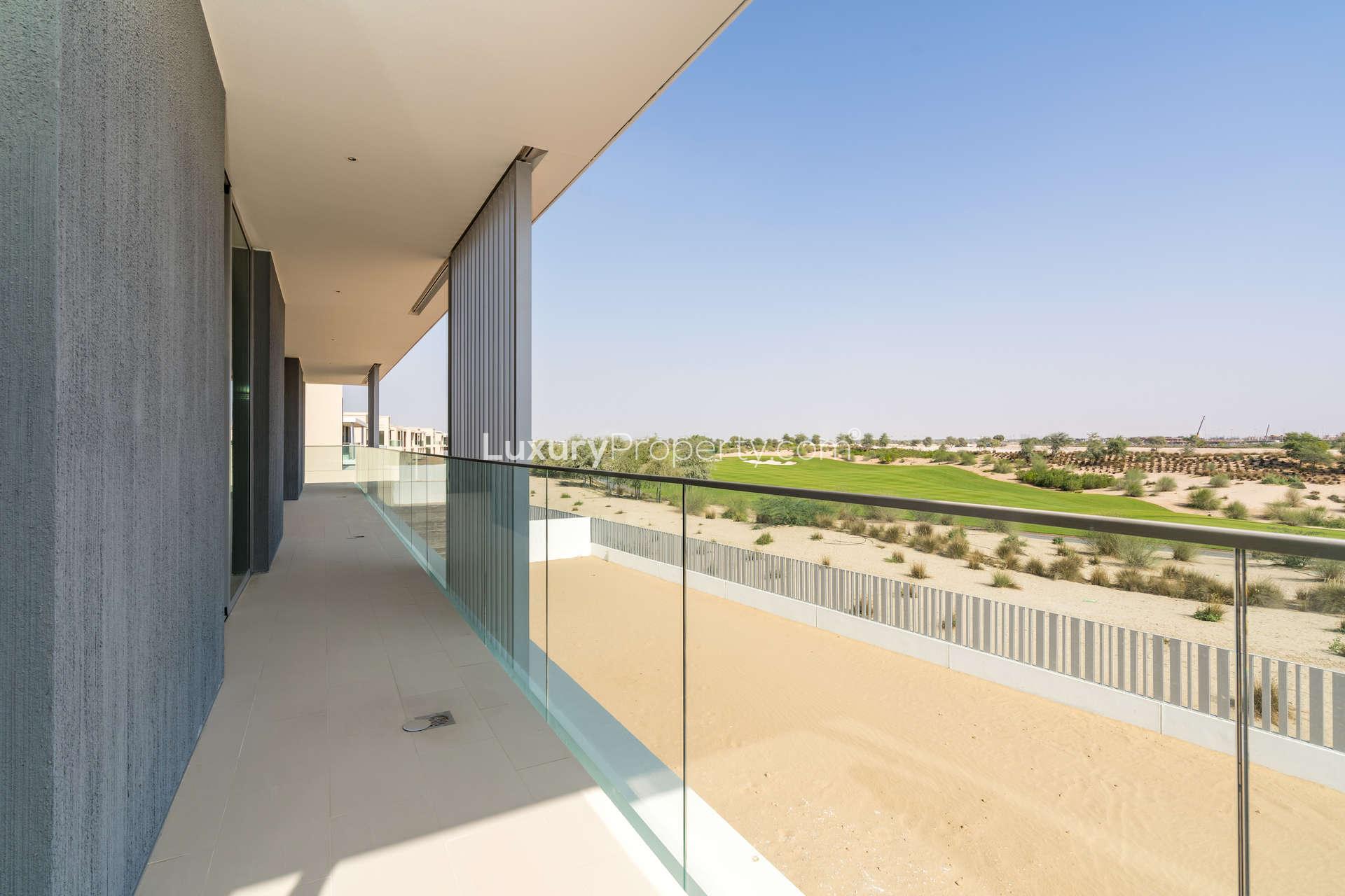 Spacious living room with large windows in Dubai Hills Estate villa for rent