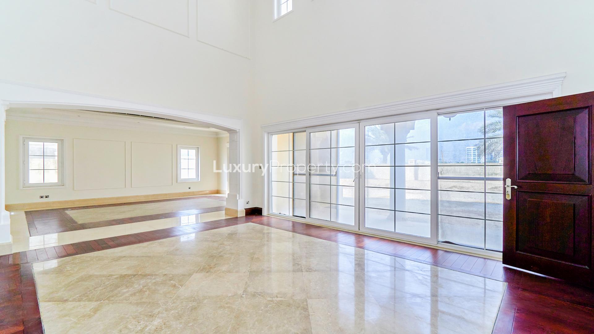 Grand 7-bed villa exterior with lush lawn, Arabian Ranches Polo Homes, available for rent