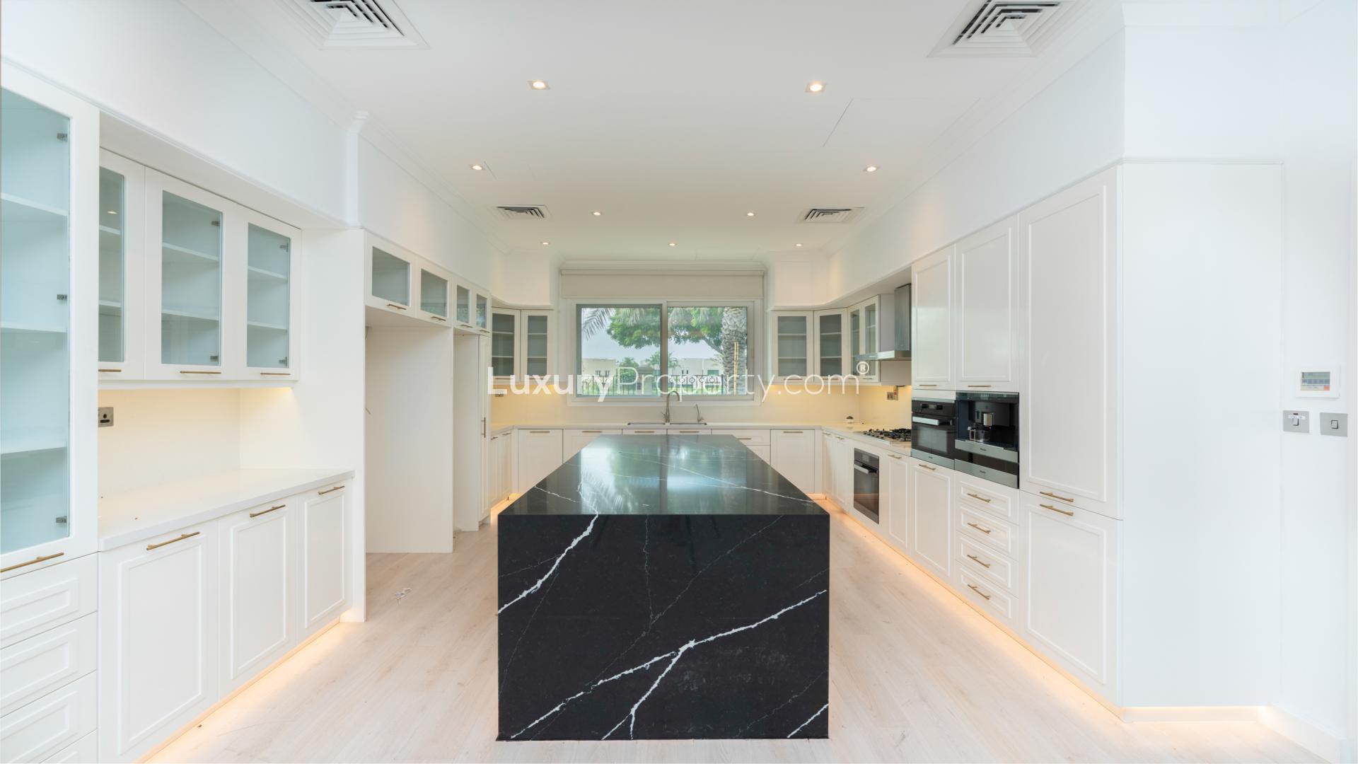 Luxurious villa interior with marble wall in Emirates Hills, Sector E, for rent