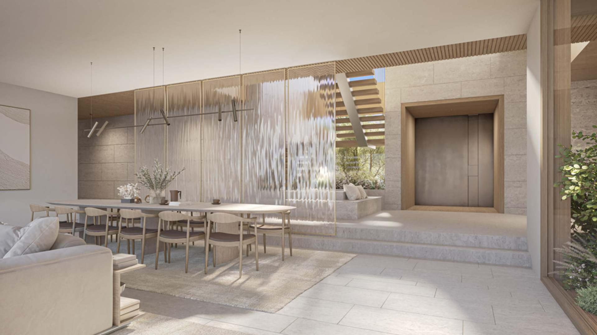 Luxurious open-plan living area in The Palm Crown villa, Palm Jumeirah, with modern decor