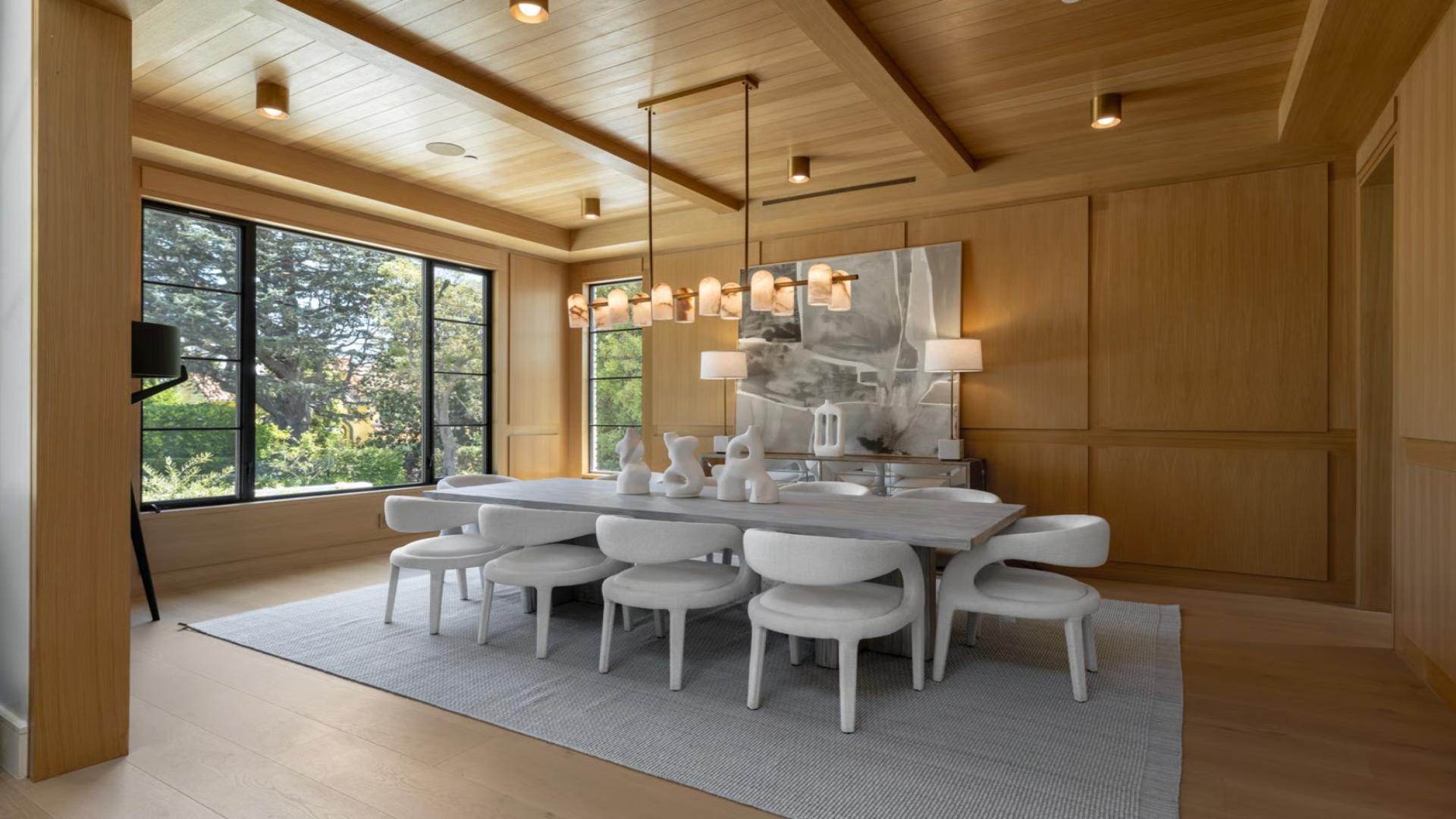 Modern kitchen and dining area in Brentwood Park villa with garden view