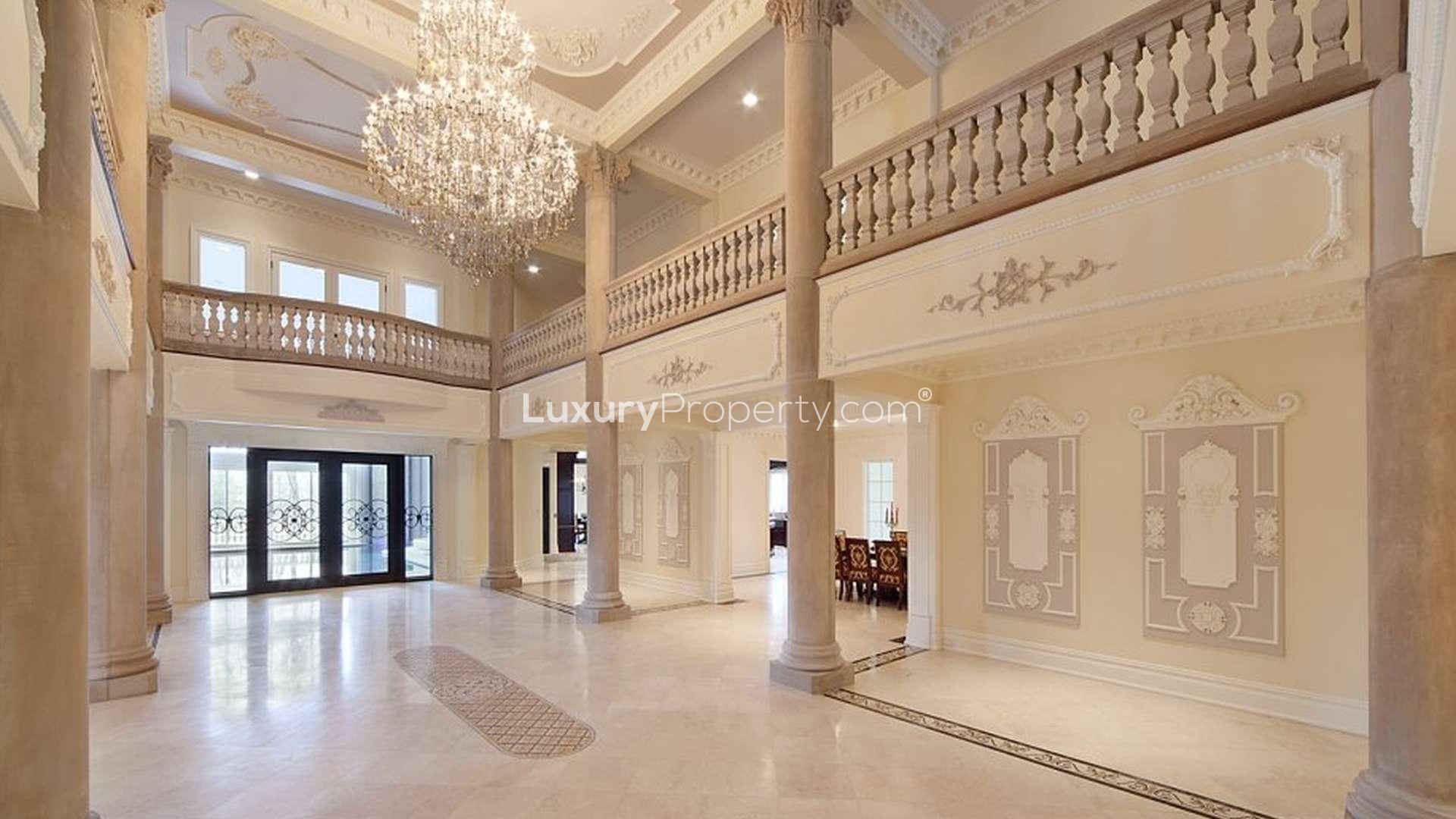 Tennis court and luxury villa exterior at 105 Chestnut Ridge Rd, Saddle River, New Jersey