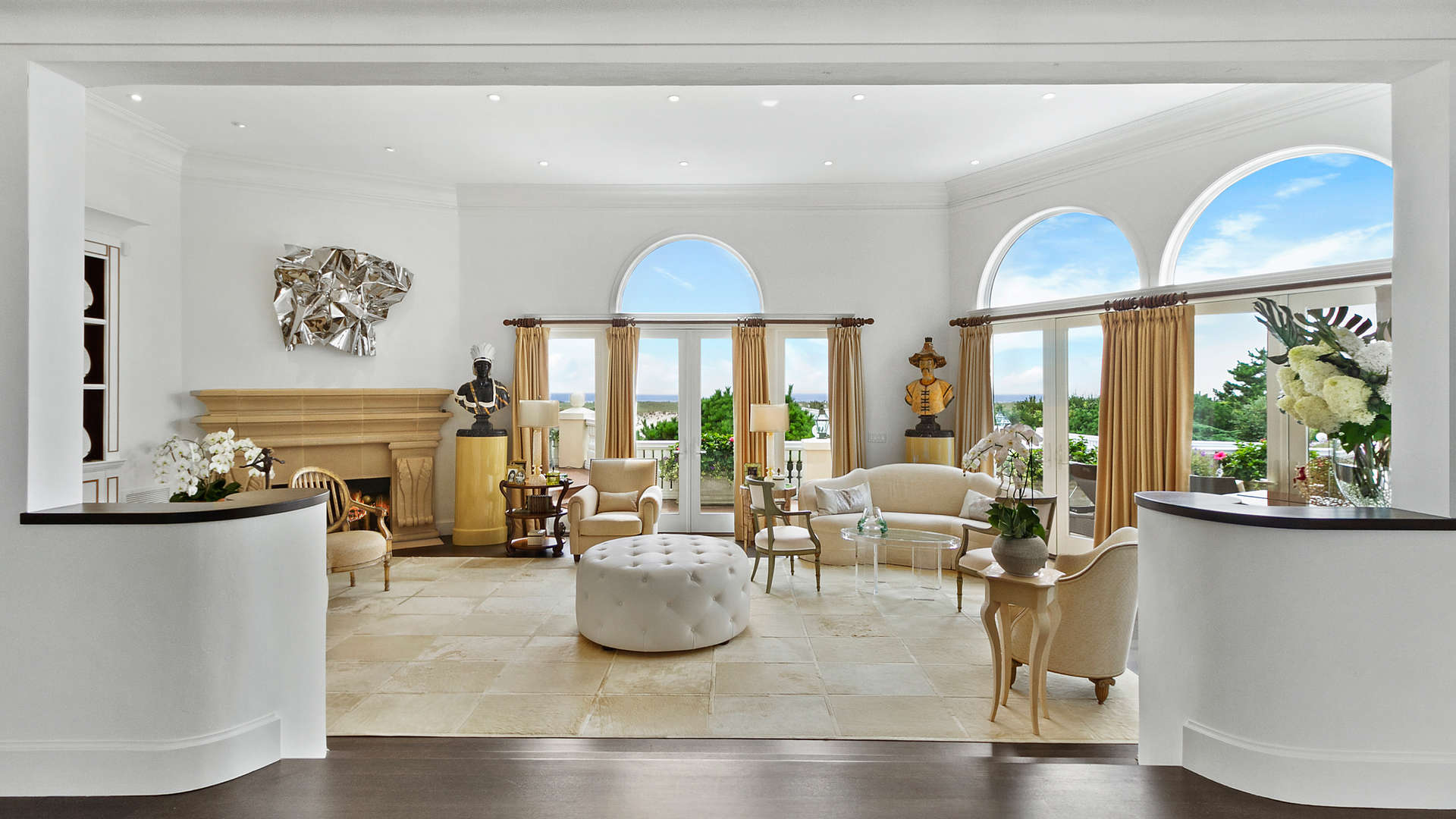 Luxurious living room with fireplace in 7-bedroom Hamptons villa for sale, Southampton