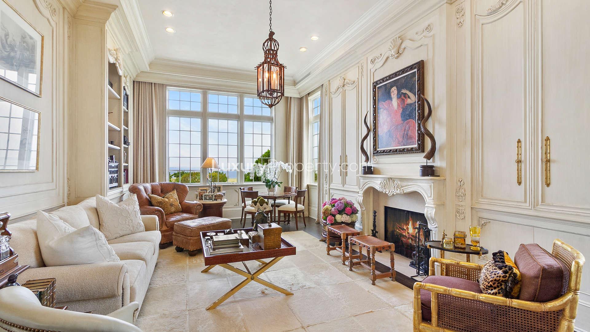 Luxury 7-bedroom villa with elegant facade and lush landscaping in Southampton, Hamptons for sale