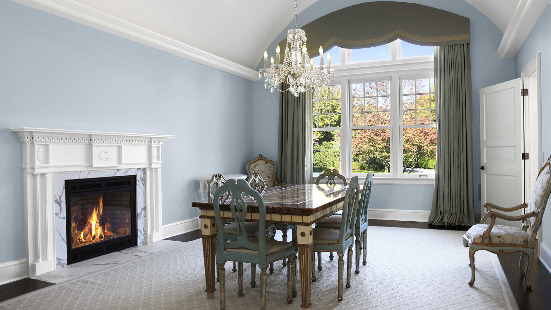 Luxurious living room with elegant decor and garden view in Hamptons villa